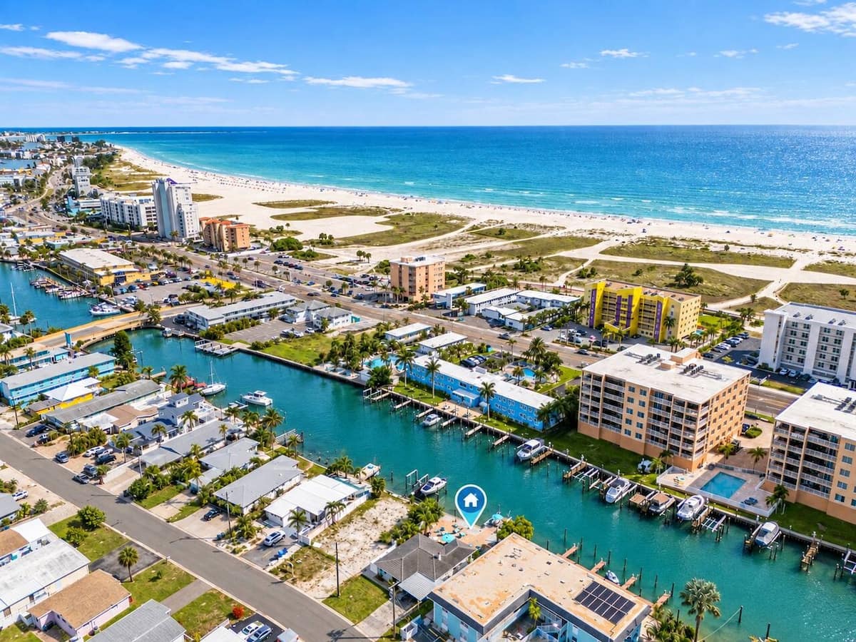 Aerial of Treasure Island, Florida showing the Gulf beach and a boat canal